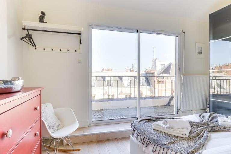 Guestready - Appartement Terrasse Vue Tour Eiffel パリ エクステリア 写真